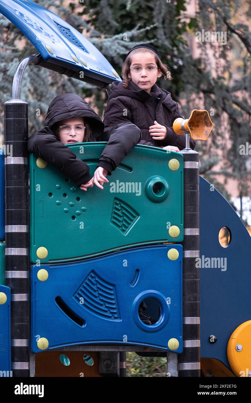 2 orthodox Jewish students hang out in Sobel Park during their recess period. In Brooklyn, New York,. Stock Photo