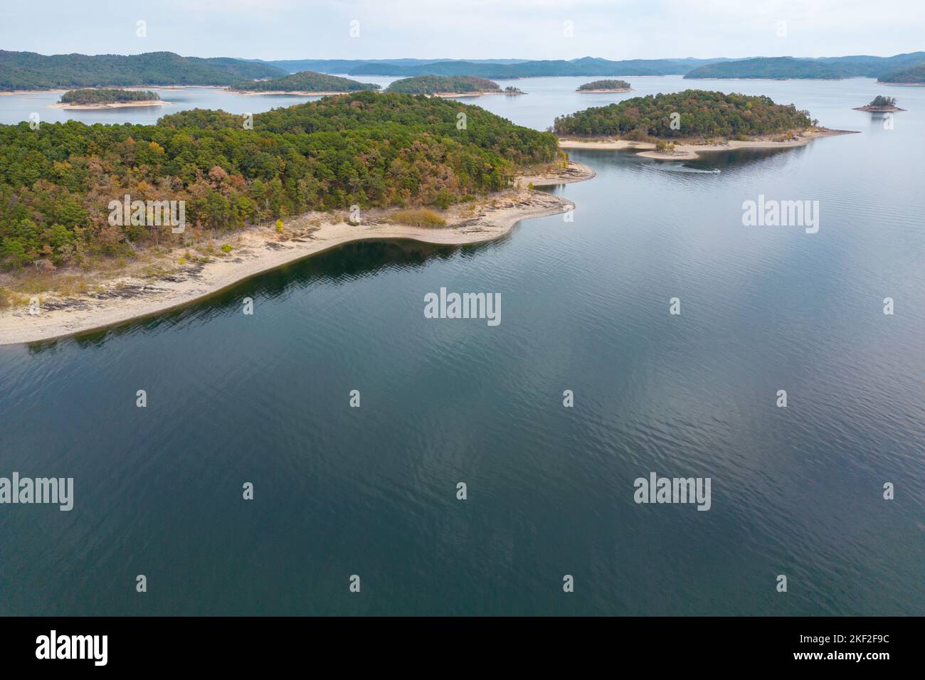 Aerial view of landscape of water of Broken Bow lake and islands with