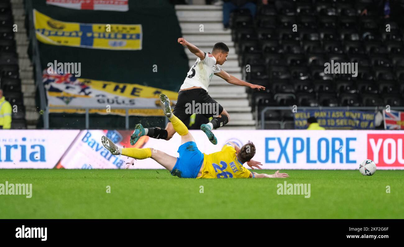 Pride Park, Derby, Derbyshire, UK. 15th Nov, 2022. FA Cup Football, Derby County versus Torquay United; Osula of Derby is tackled by Ness of Torquay Credit: Action Plus Sports/Alamy Live News Stock Photo