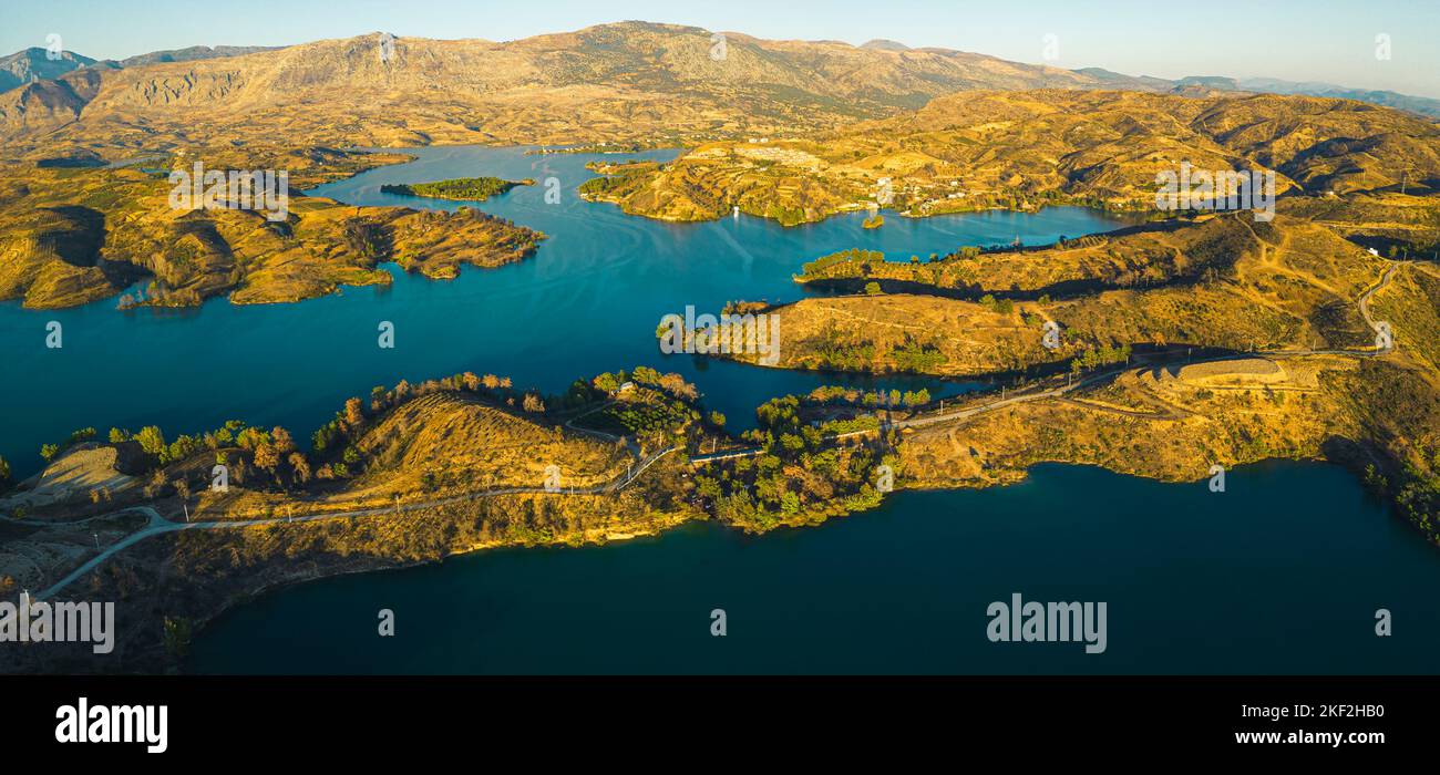 Birdseye view of hills surrounding Green Lake Manavgat. Turkish summer green landscape with deep blue water. Horizontal outdoor panoramic shot. High quality photo Stock Photo