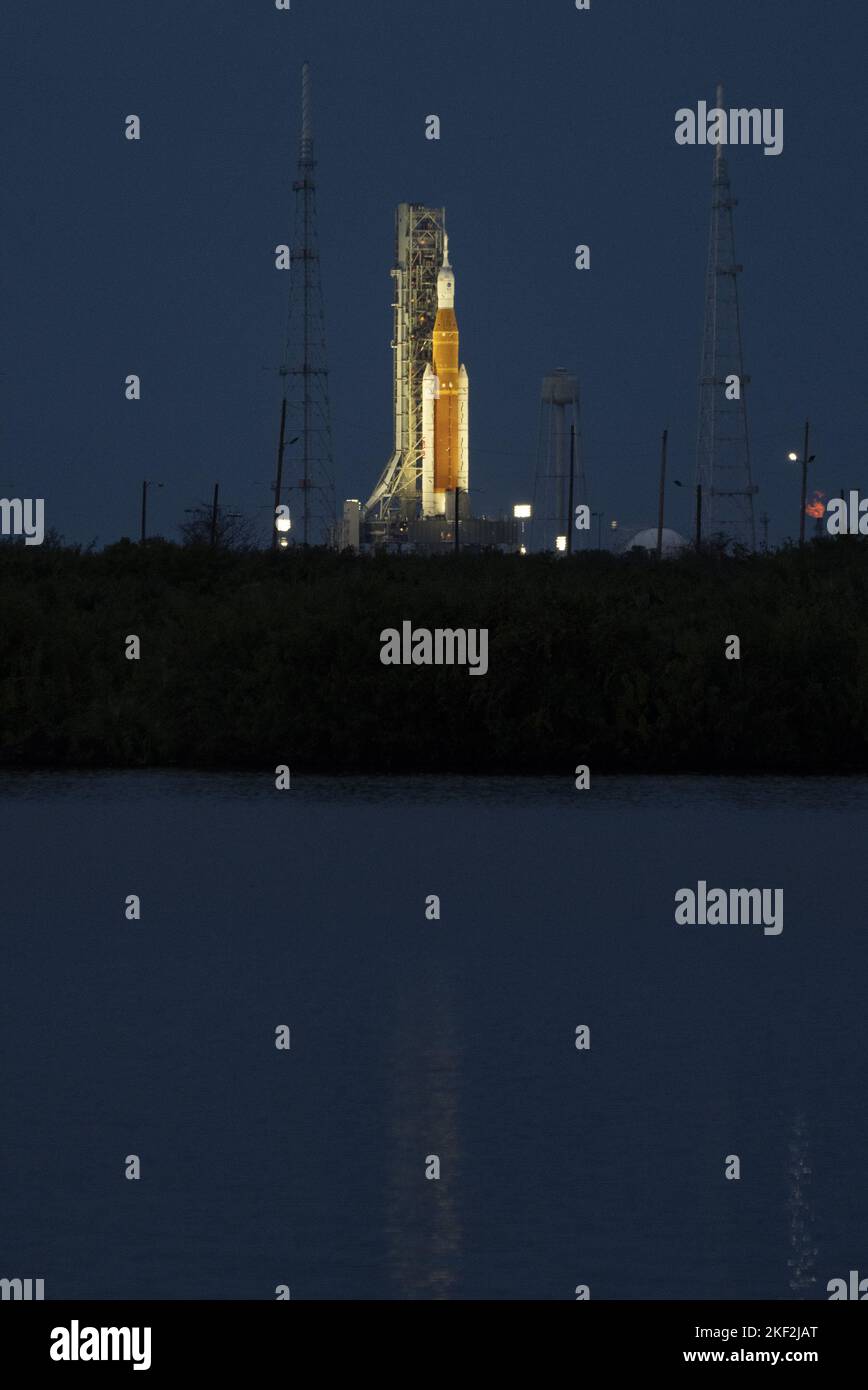 Kennedy Space Center, United States. 15th Nov, 2022. NASA's Artemis 1 stands on Launch Pad 39B shortly after sunset at the Kennedy Space Center, Florida on Tuesday, November, 15, 2022. The Space Launch System (SLS) rocket with the Orion spacecraft is expected to launch on Wednesday morning at 1:04 a.m, November 16, 2022. It will orbit the moon as the first step for the United States to send astronauts back to the lunar surface after 50 years. Photo by Pat Benic/UPI Credit: UPI/Alamy Live News Stock Photo