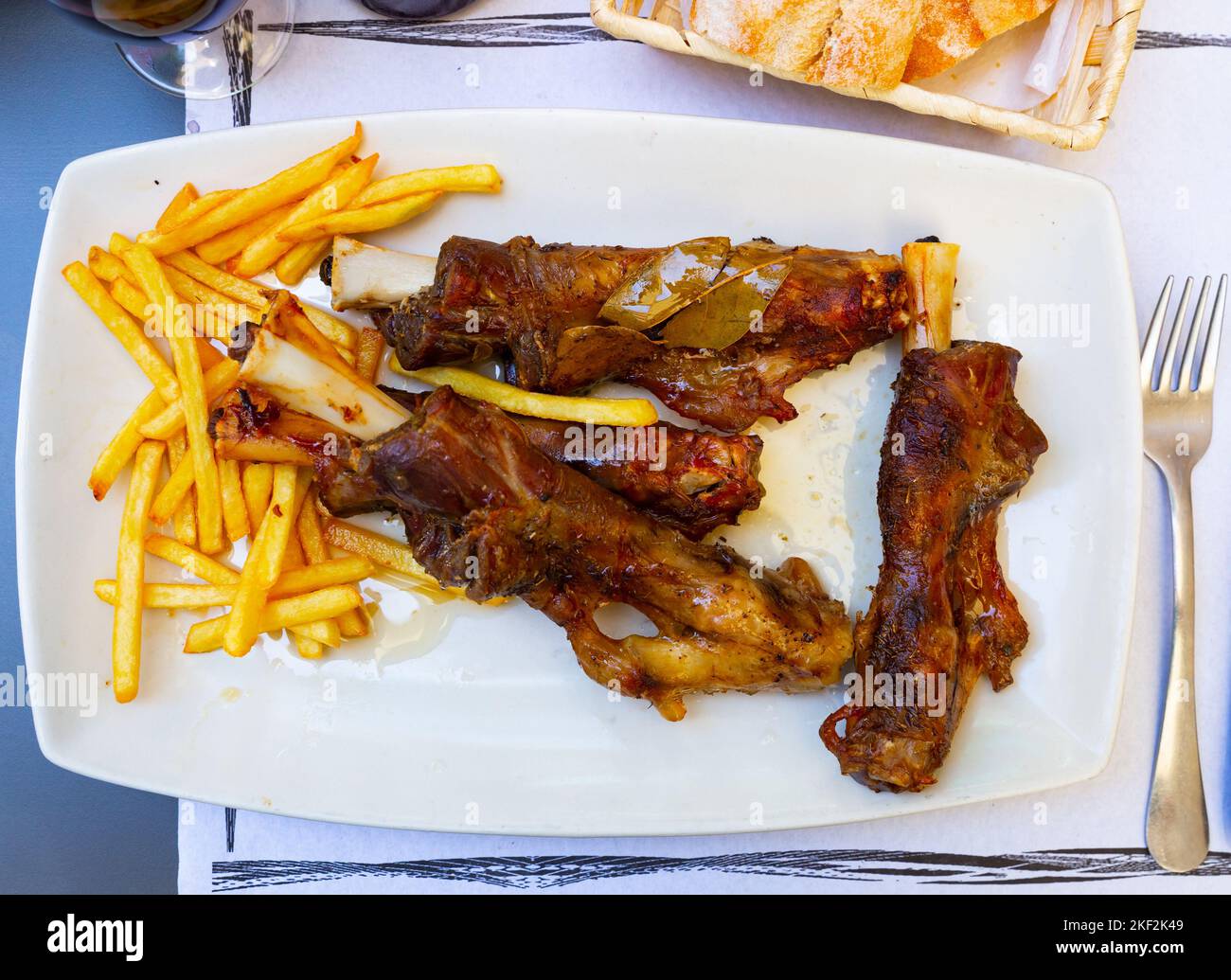 Baked in oven lamb shanks Stock Photo - Alamy