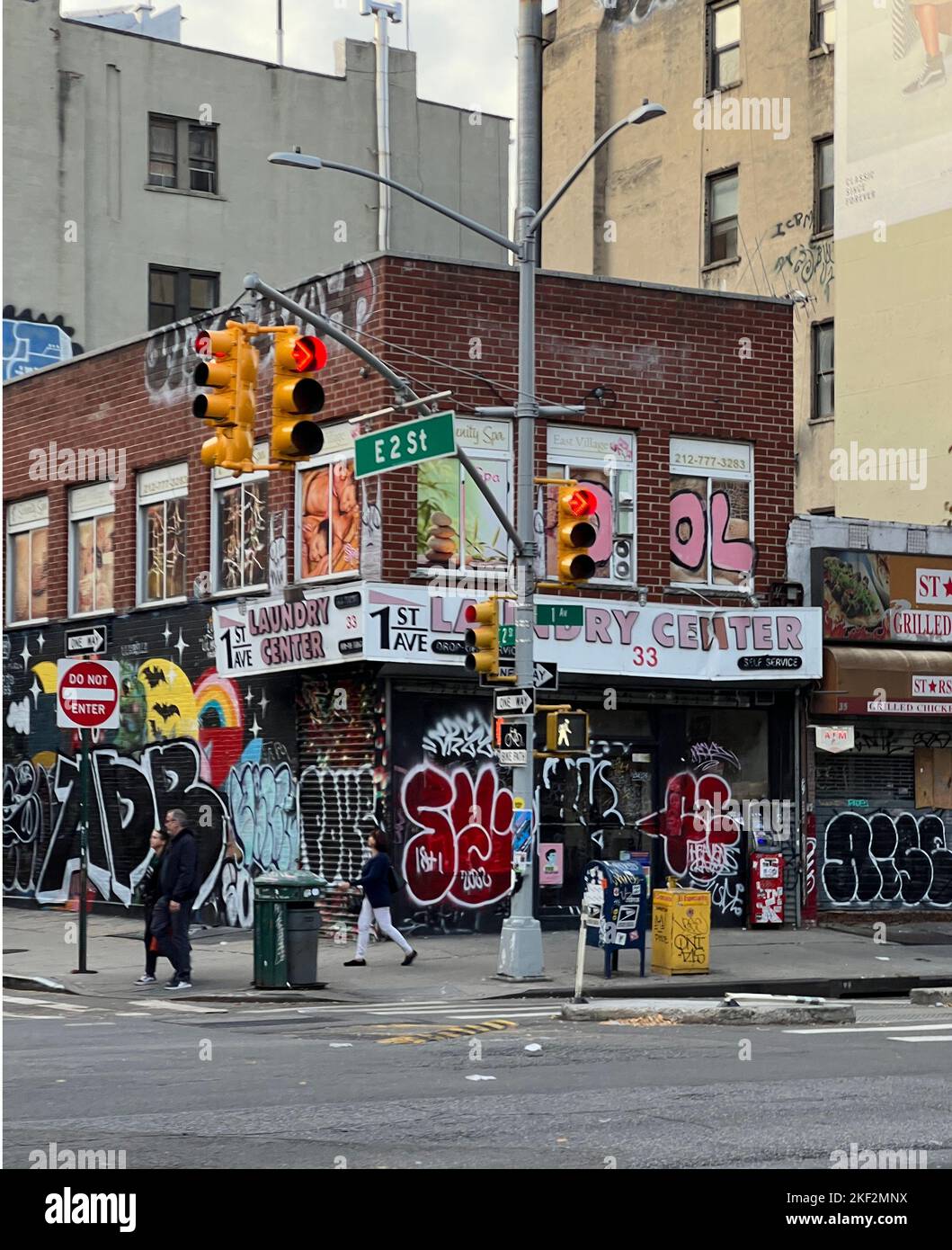 Corner of 2nd Street and 1st Avenue in the graffiti splattered East Village in New York City. Stock Photo