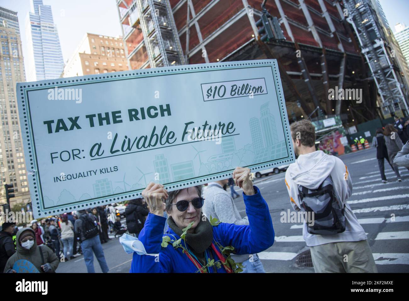 Extinction Rebellion and other groups march along Park Avenue stopping at J.P.Morgan Chase, Black Rock and other huge investment firms telling them to stop investing in fossil fuels and replace greed with care for the future of humanity and stop the growing climate catastrophe. Stock Photo