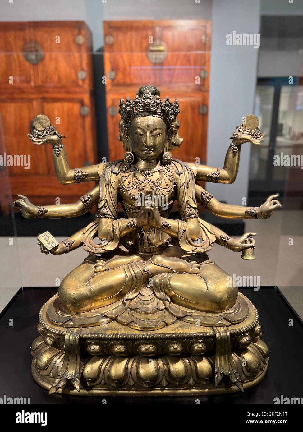 Marichi, Goddes of Dawn; China, Qing Dynasty, 18th century, gilt bronze.  As the Buddhist goddess of dawn, Marichi represents the light of truth breaking through the darkness of ignorance. Stock Photo
