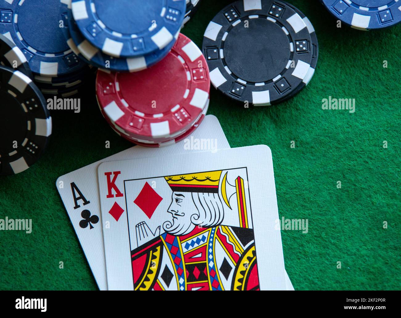 Poker chips on a blackjack hand Stock Photo