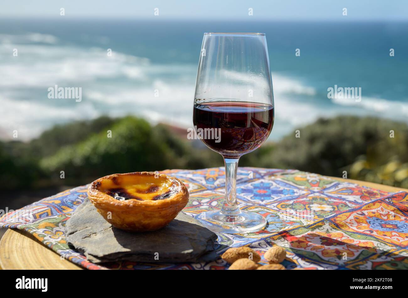 Portugal's traditional food and drink, glass of porto wine and sweet