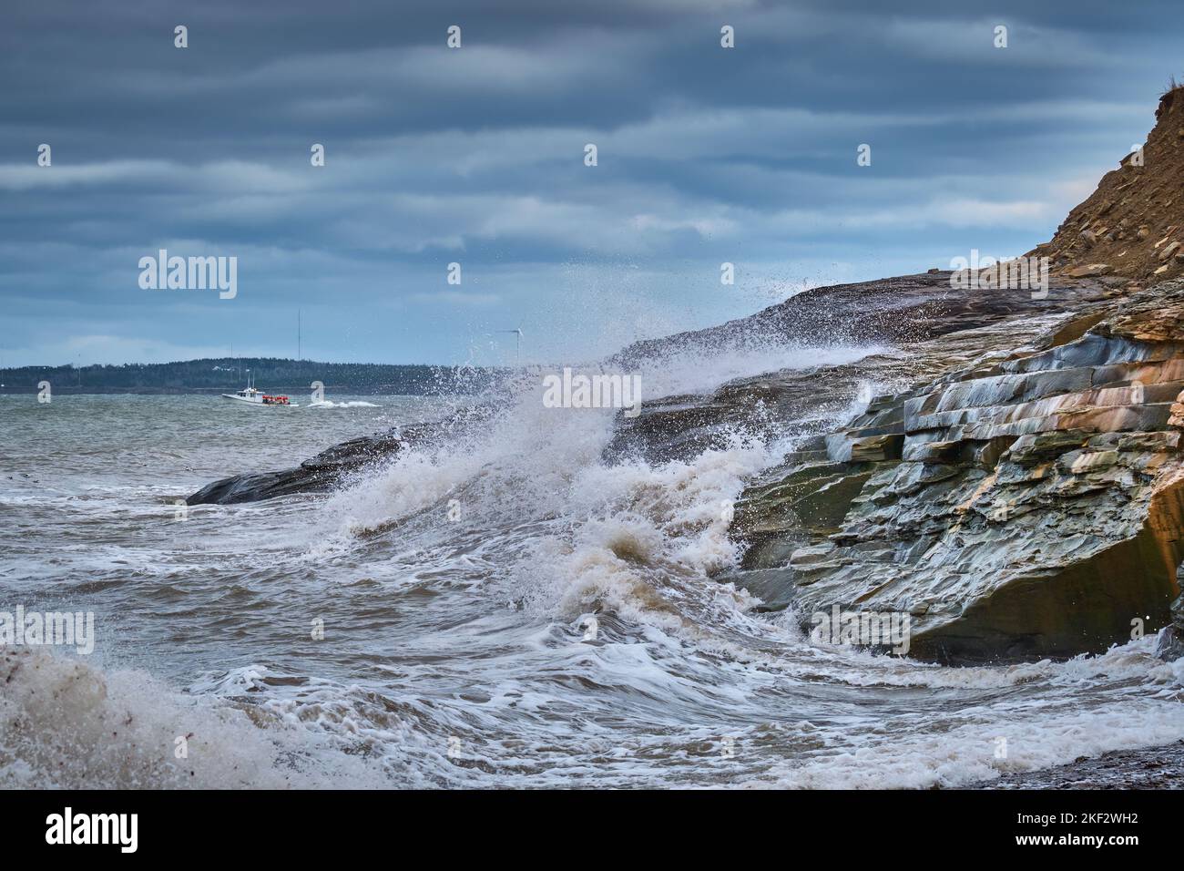 Dramatic waves battter the cliffs at Table Head Beach in Glace Bay Cape