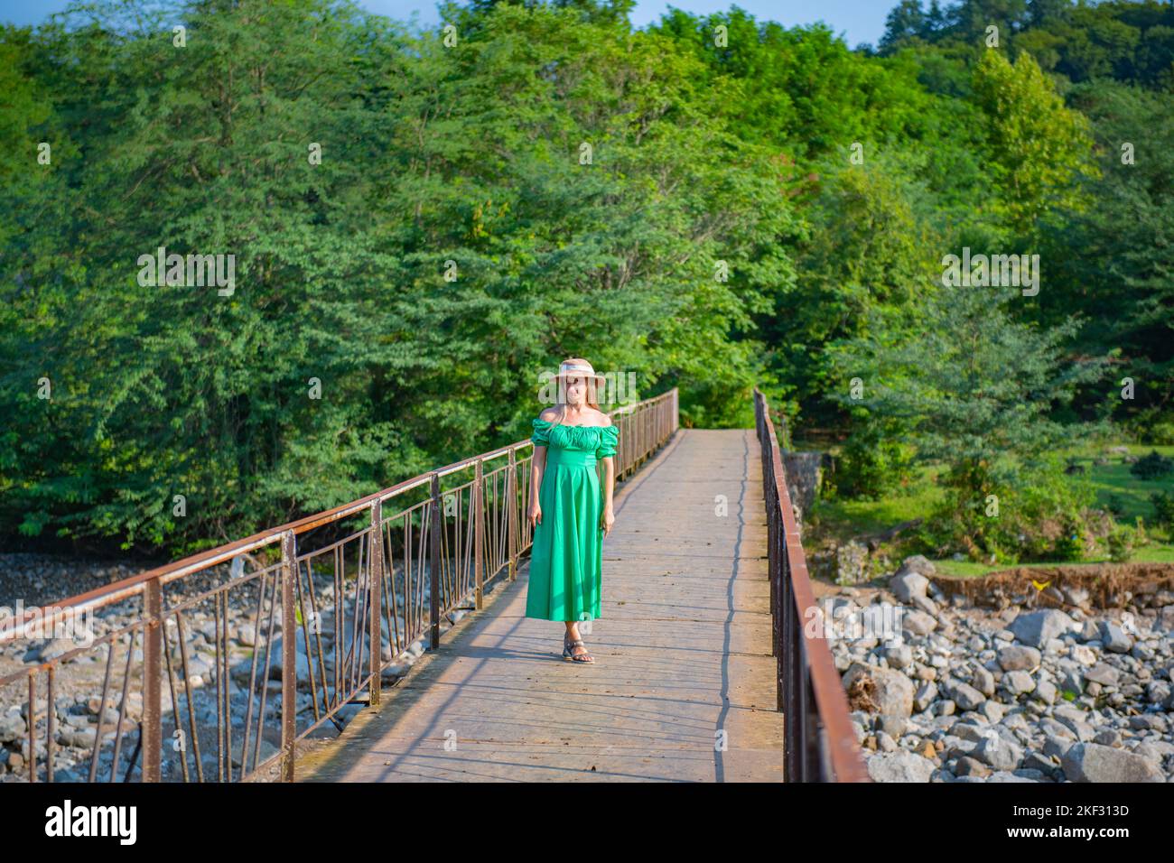 the girl on the bridge is standing Stock Photo - Alamy