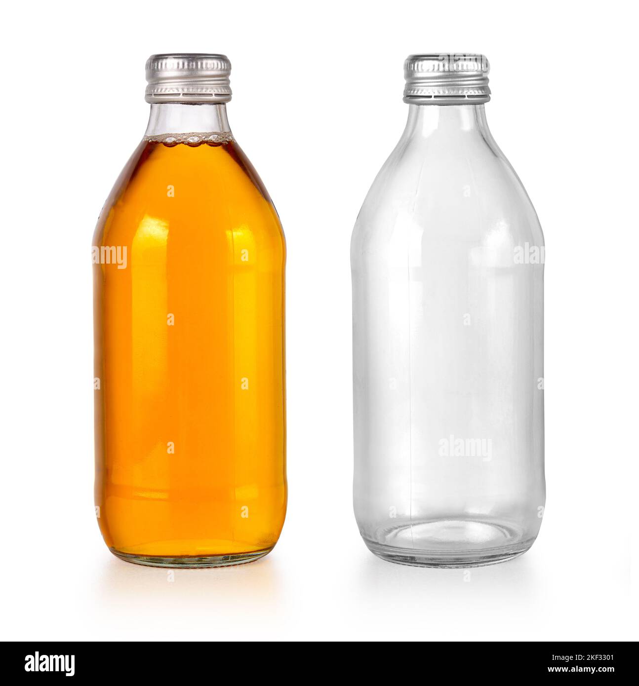 Small bottle of apple juice isolated on white background Stock Photo