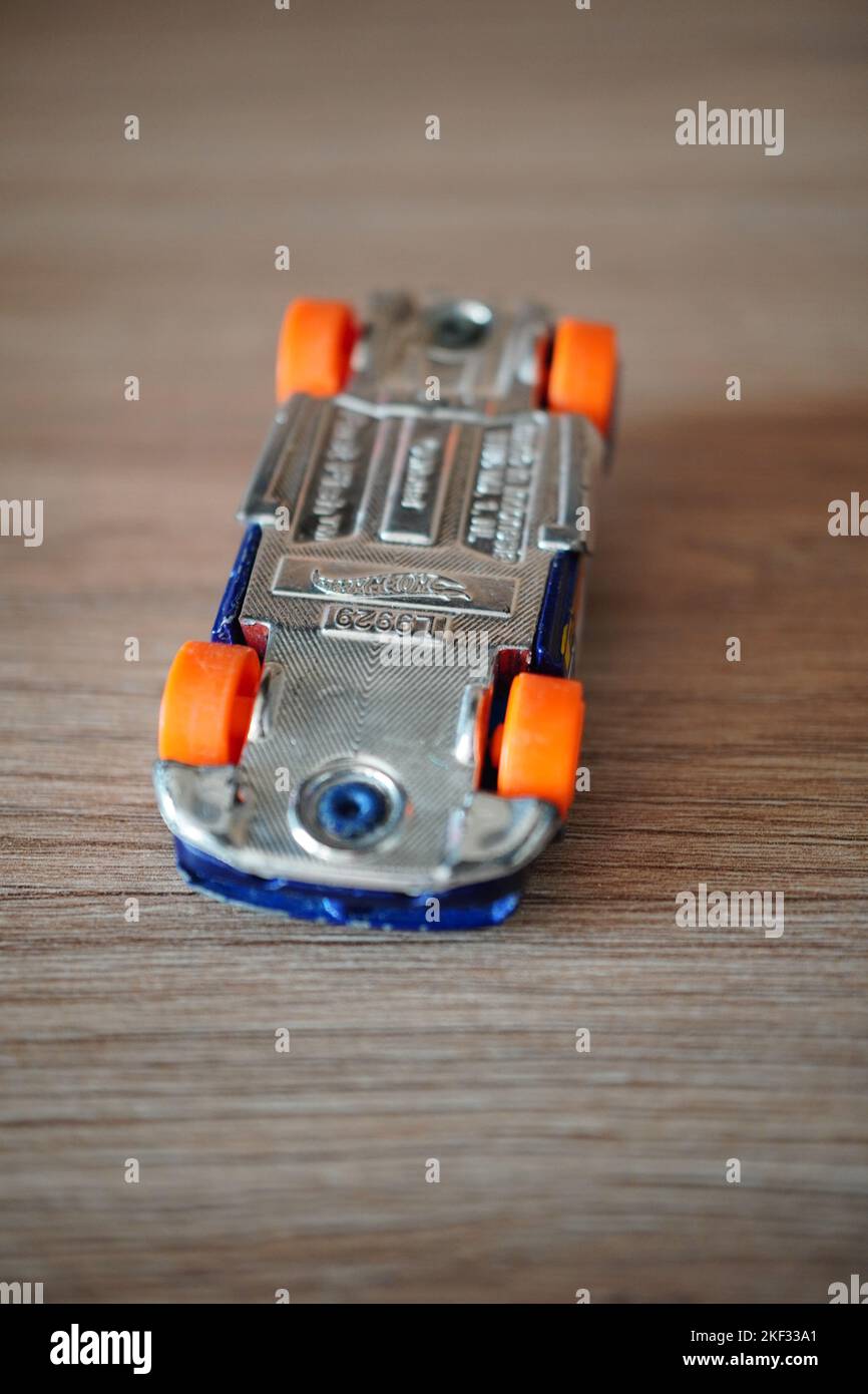 A Mattel Hot Wheels toy model Fast Fish race car laying upside down Stock Photo Alamy