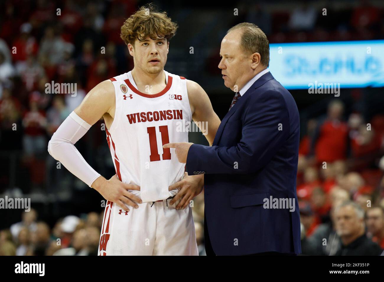 Madison, WI, USA. 15th Nov, 2022. Wisconsin Badgers head coach Greg Gard talks with guard Max