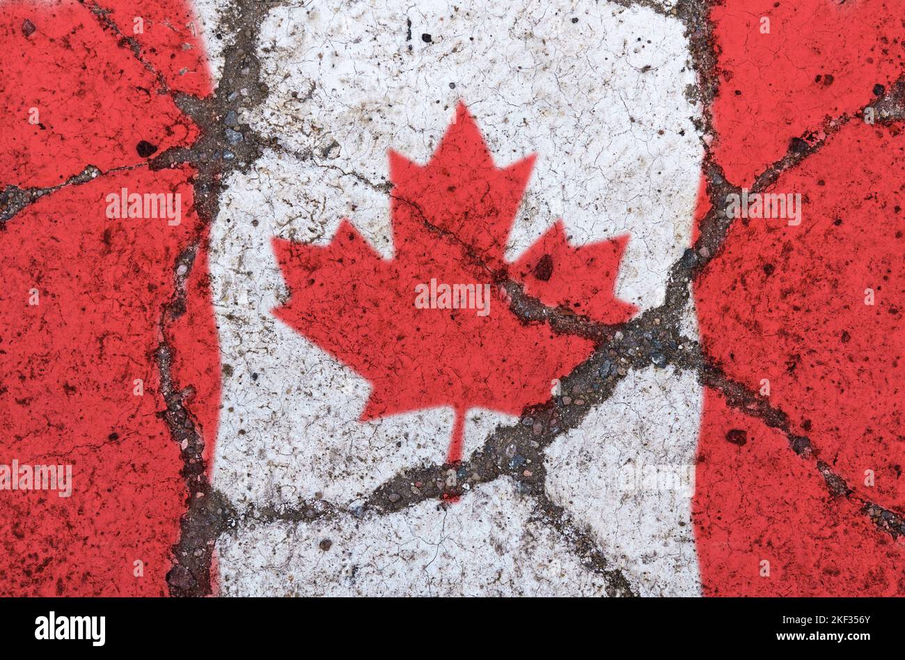 Flag of Canada on cracked pavement. The concept of crisis, default ...