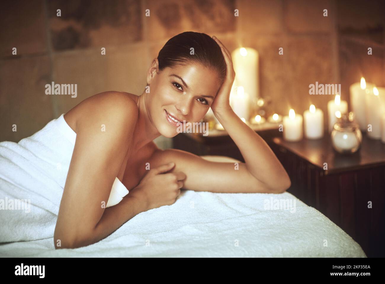 Do more of what makes you happy. Closeup shot of a young woman relaxing during a spa treatment. Stock Photo