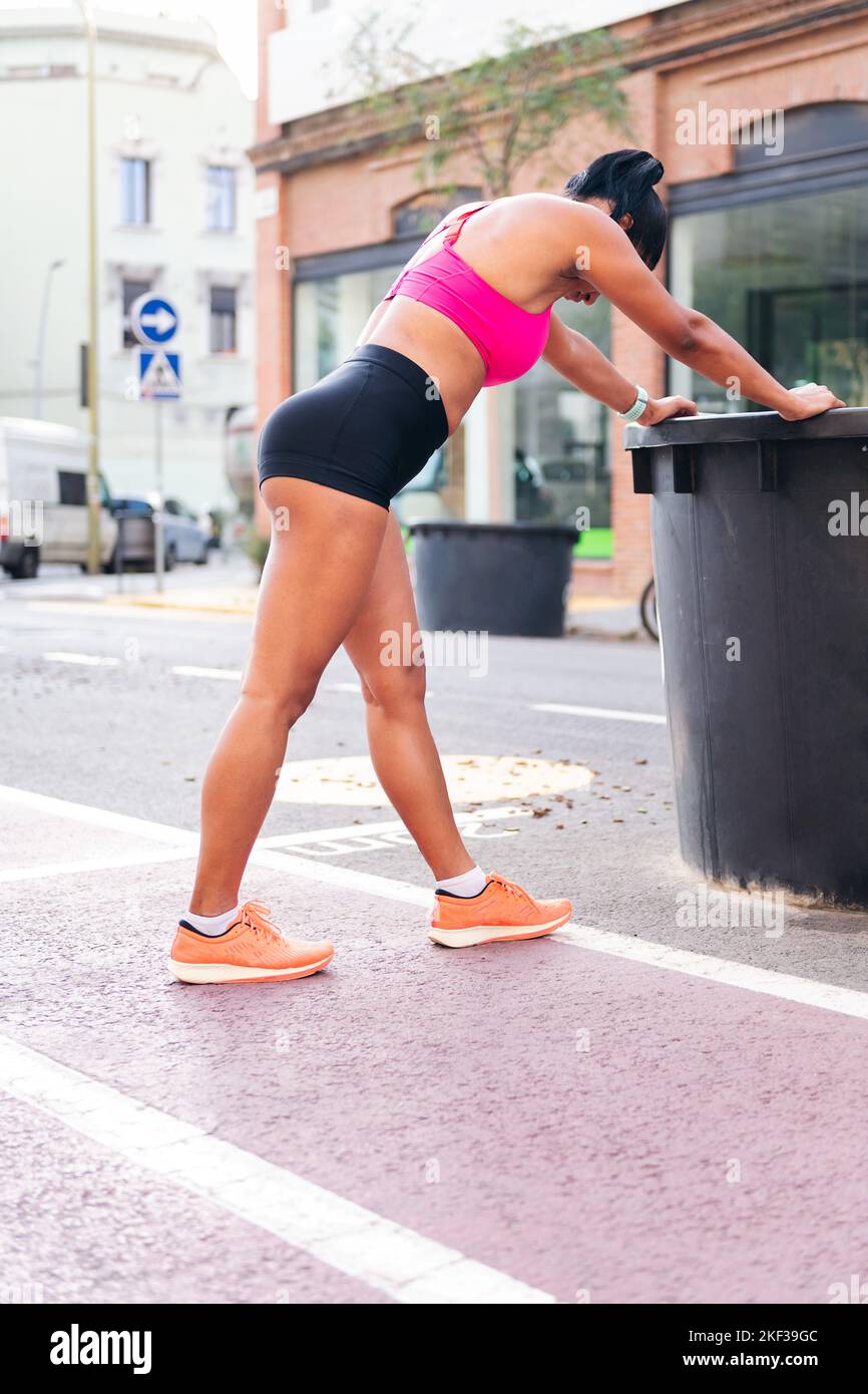 sportswoman resting and catching her breath Stock Photo Alamy