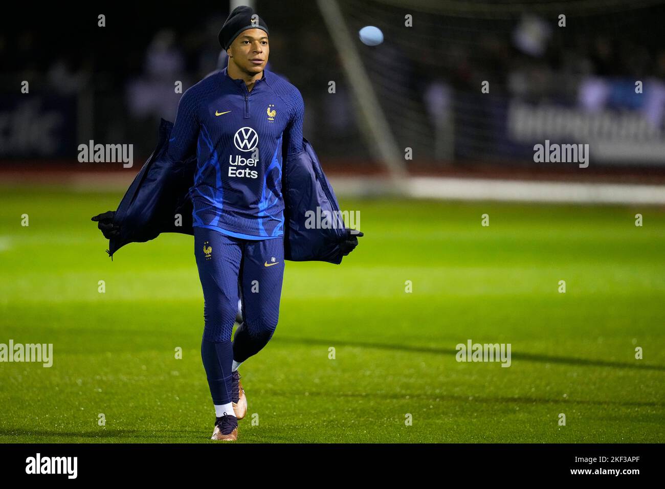 CLAIRE FONTAINE - NOVEMBER 15 : Kylian Mbappe is removing his jacket as the  training gets harder during the 2nd training of the French Soccer National  Team prior to the departure for