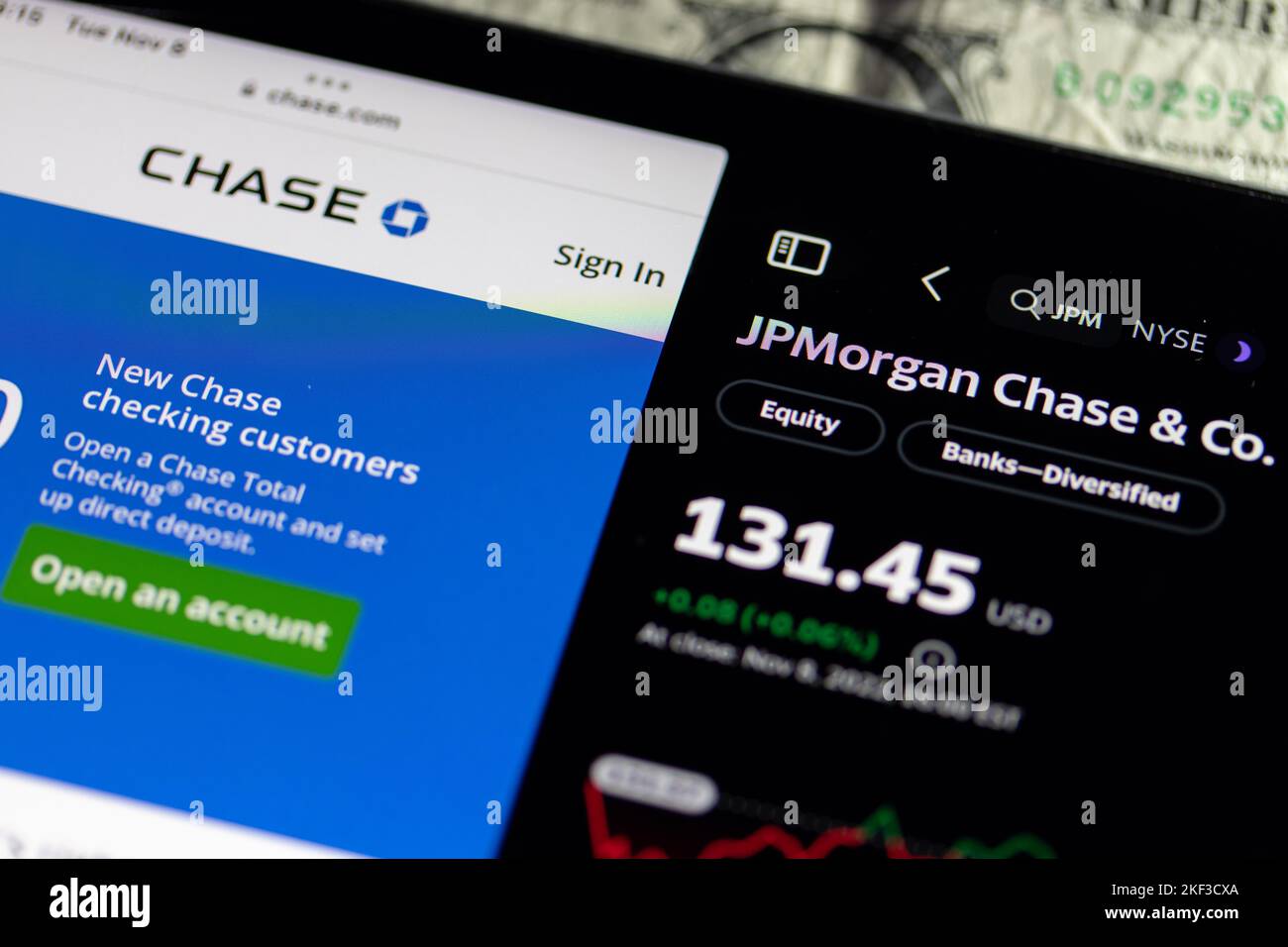 The JPMorgan Chase and Co., JPM on the NYSE, their share price is seen on a digital screen, next to the Chase bank website. Stock Photo