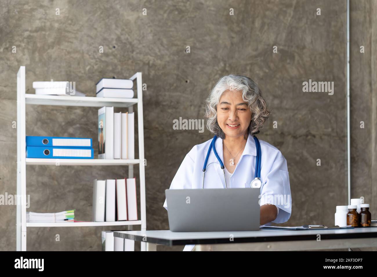 Asian senior doctor hospital medical medicine health care clinic office