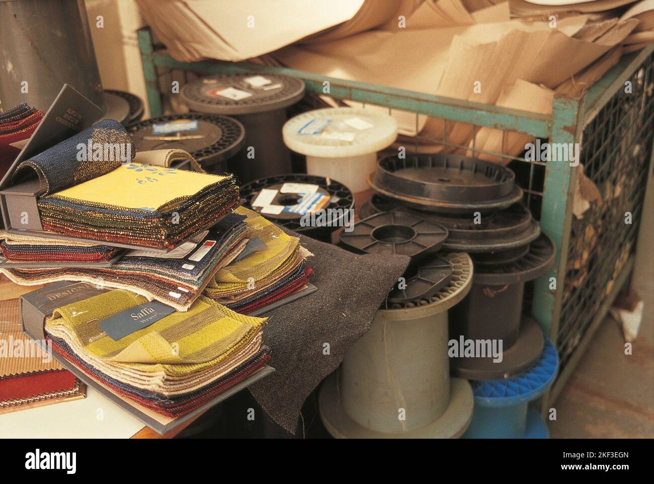 Fabric swatches and spools Stock Photo - Alamy