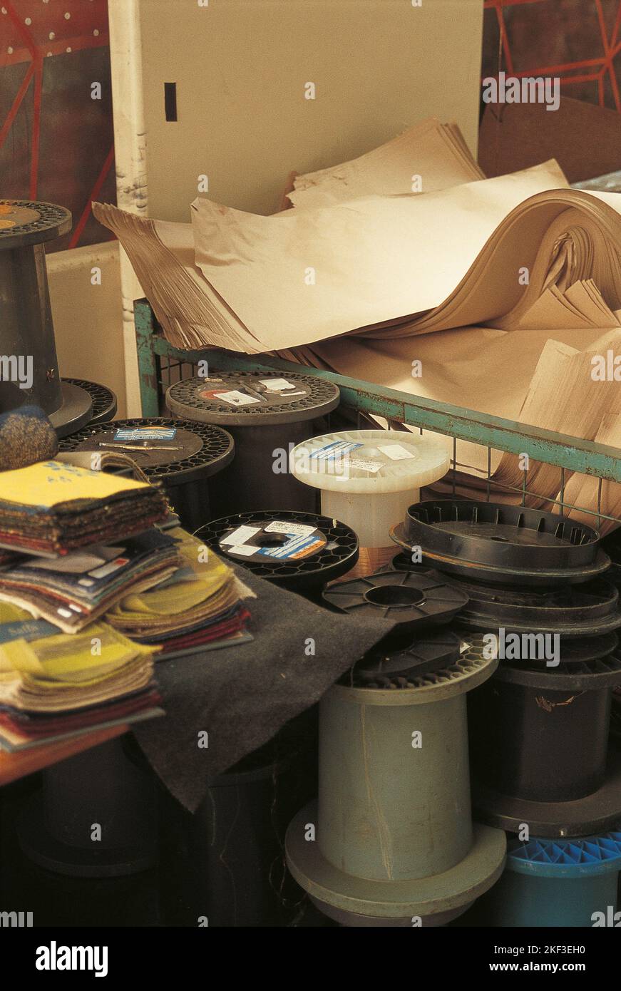 Spools and fabric swatches Stock Photo - Alamy