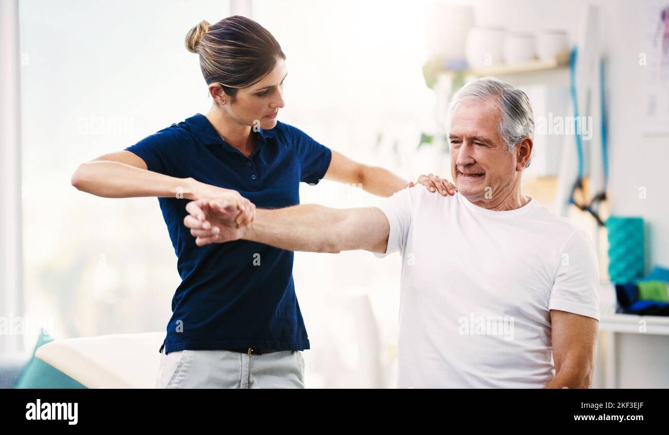 Physiotherapist, senior man and patient stretching, health and wellness