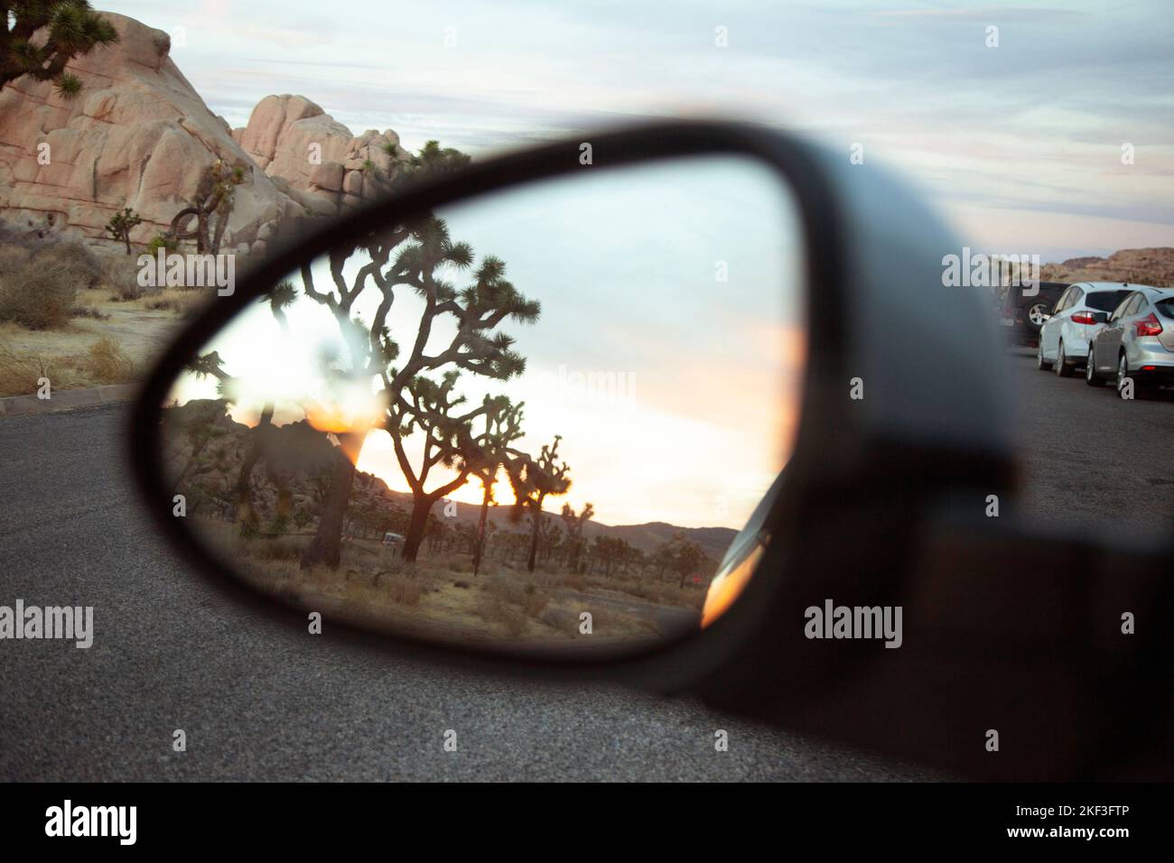 Wing mirror of car driving on highway Stock Photo Alamy