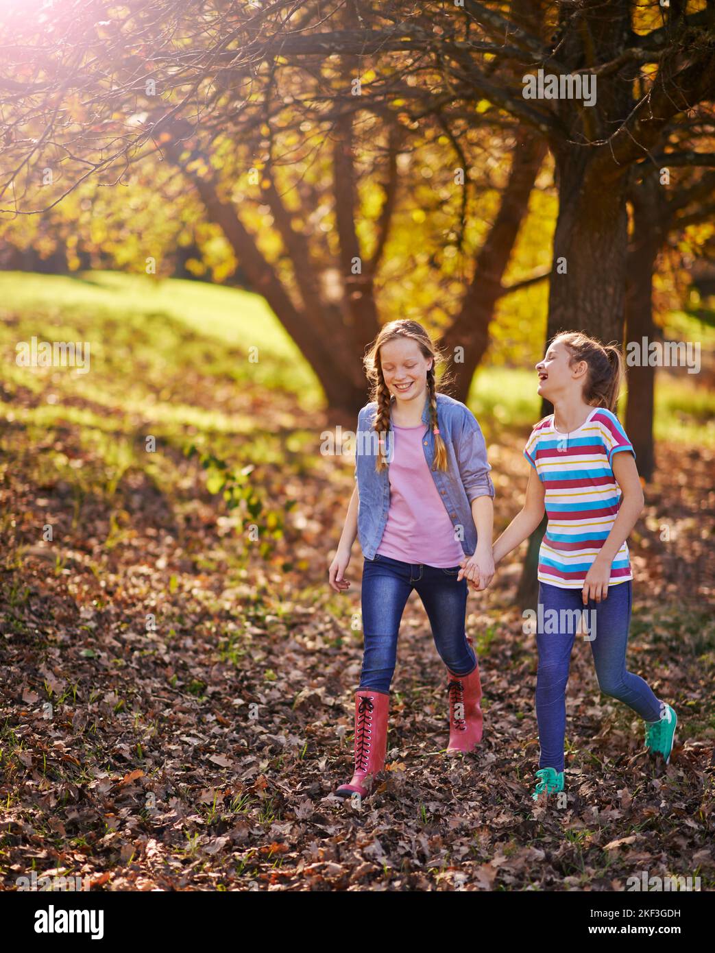 Fun in the forest. two young girls walking together in nature Stock ...
