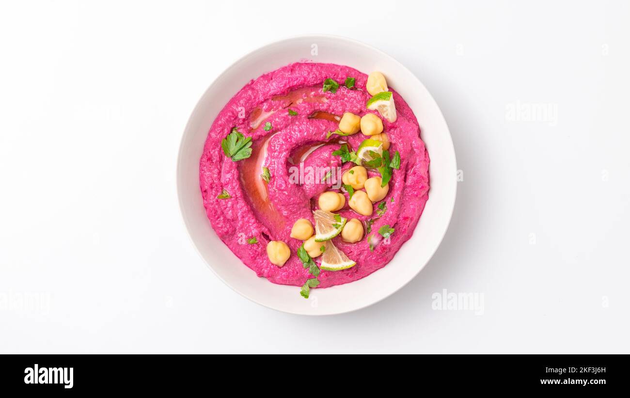 beetroot hummus isolated on white background, top view Stock Photo
