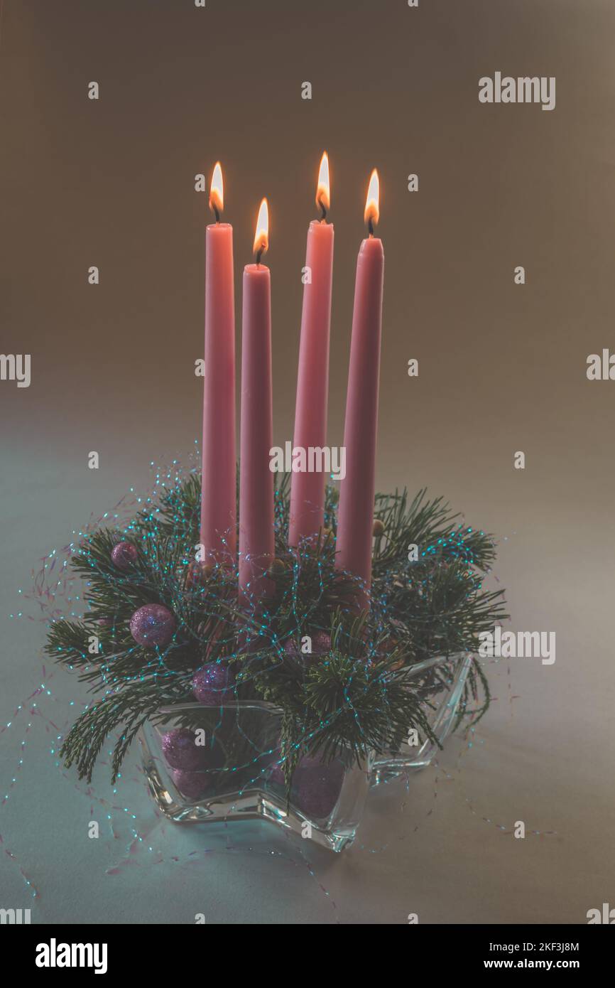 4 pink advent candles in religious cristian traditional wreath