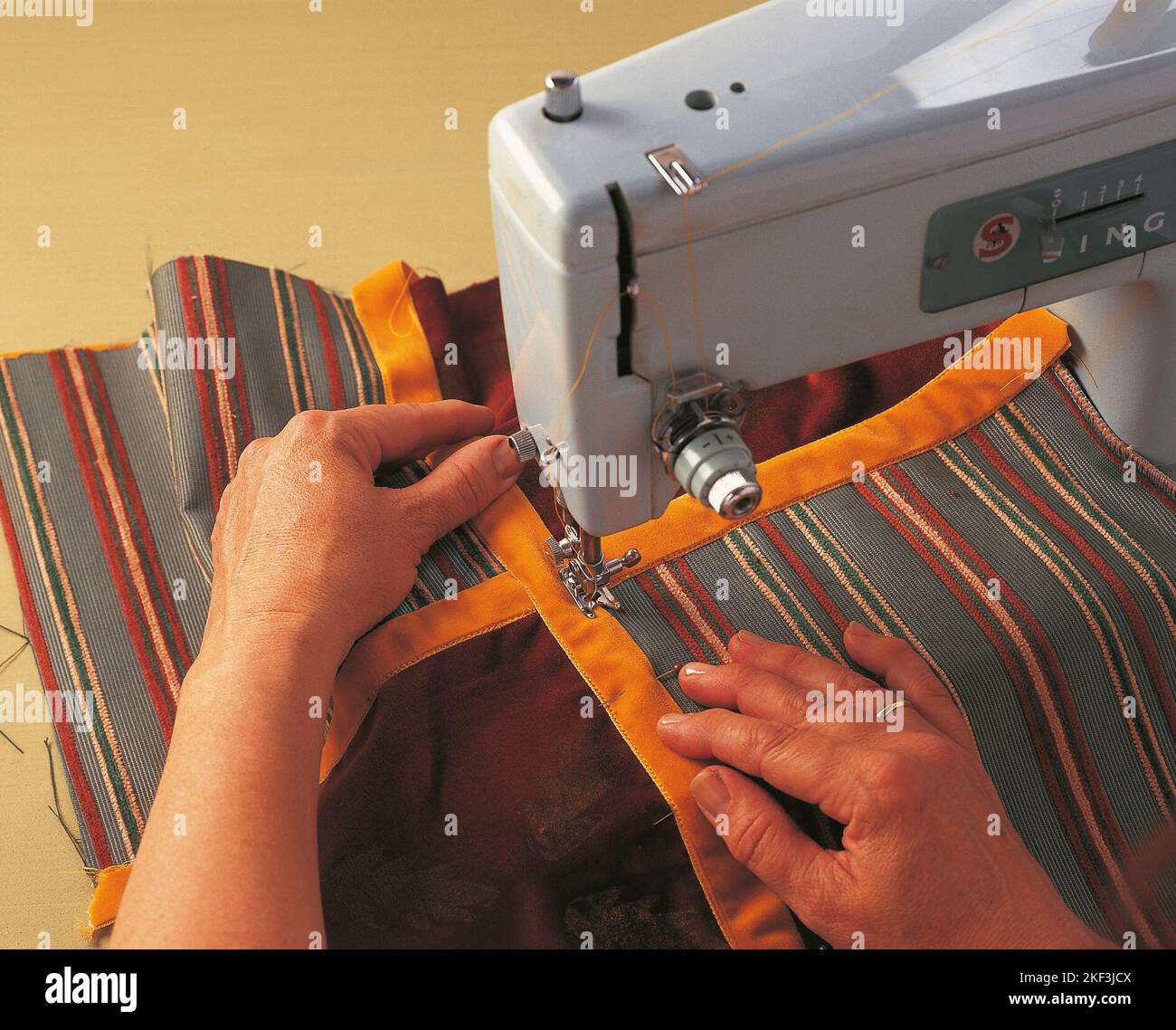 Joining pieces of fabrics together Stock Photo Alamy
