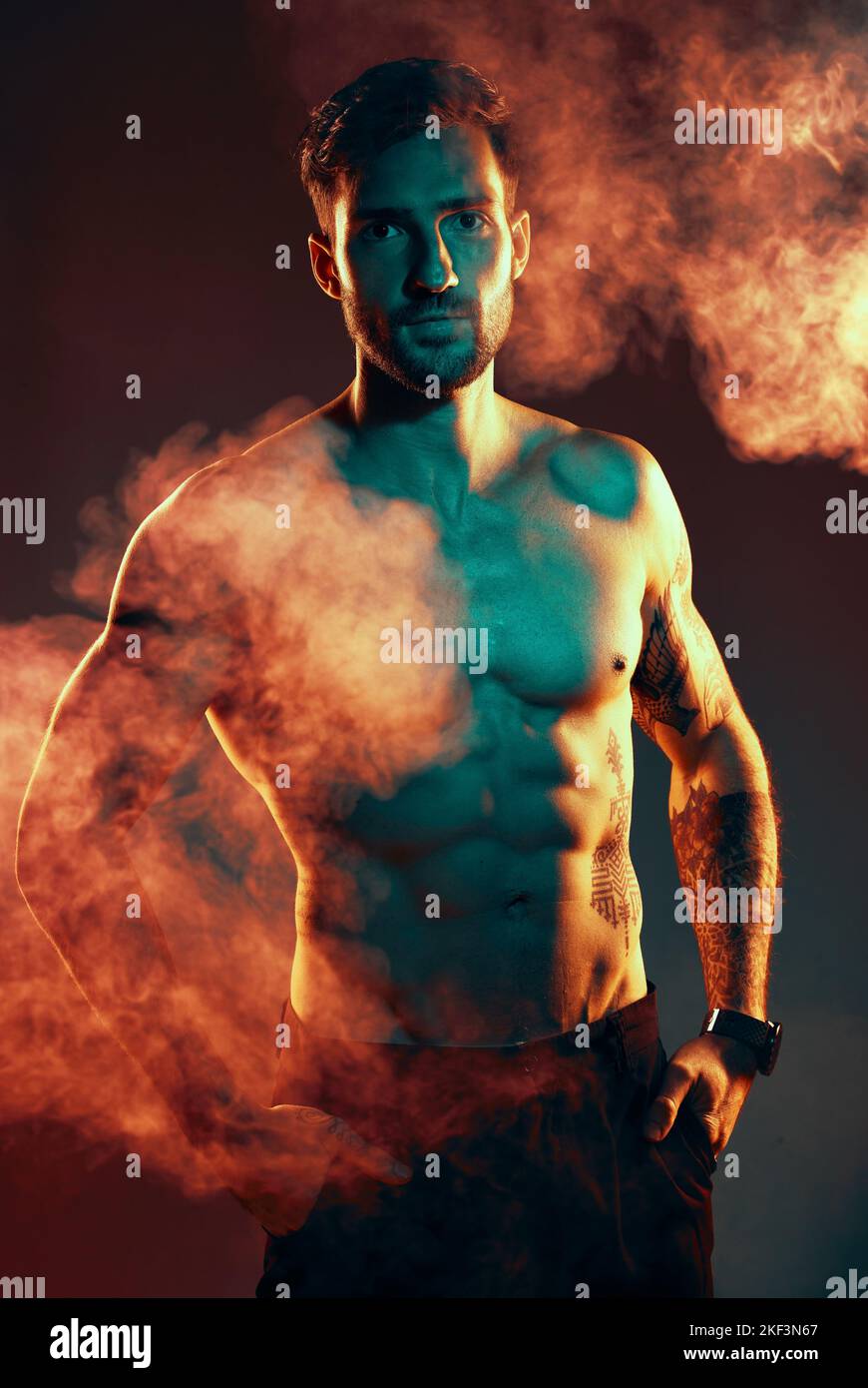 Fitness, body and man in a studio with smoke or mist after an intense
