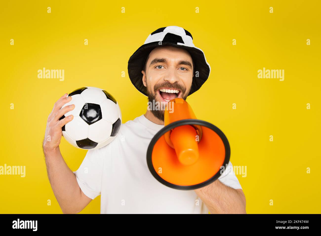 Football fan with megaphone hi-res stock photography and images - Alamy