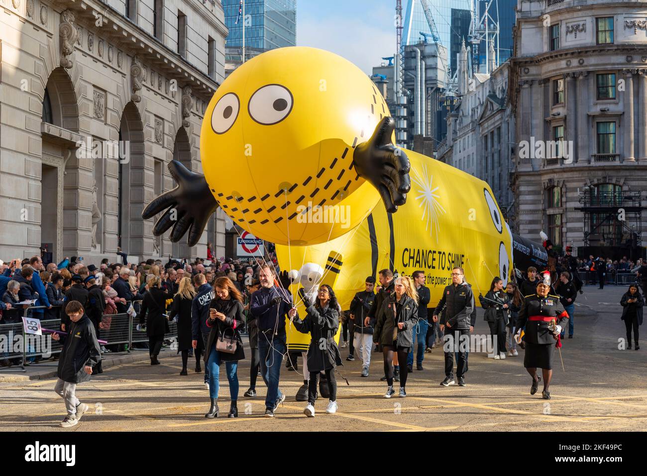 Miller Insurance inflatables, a chance to shine, at the Lord Mayor's Show parade in the City of London, UK. Cricket bat and ball inflatables Stock Photo