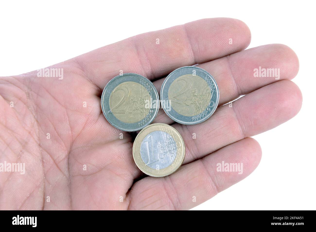 Euro Münzen , 5 Euro,  Kleingeld in einer Hand Stock Photo