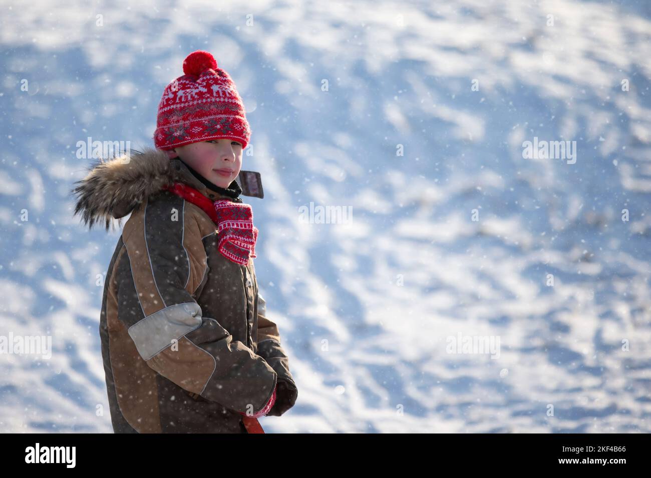 Small child walks on snow hi-res stock photography and images - Alamy