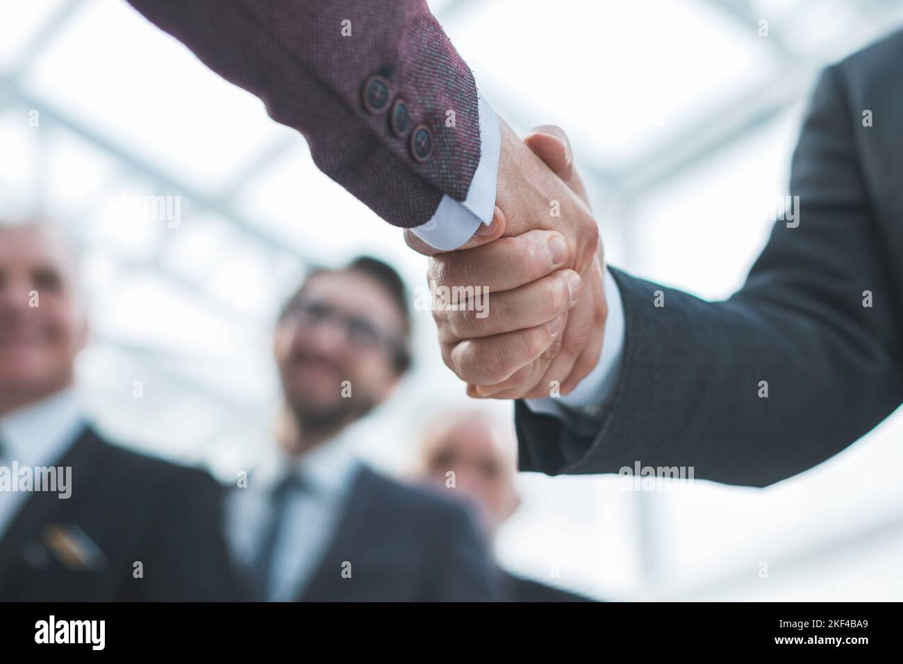 close up. business people greeting each other with a handshake Stock ...