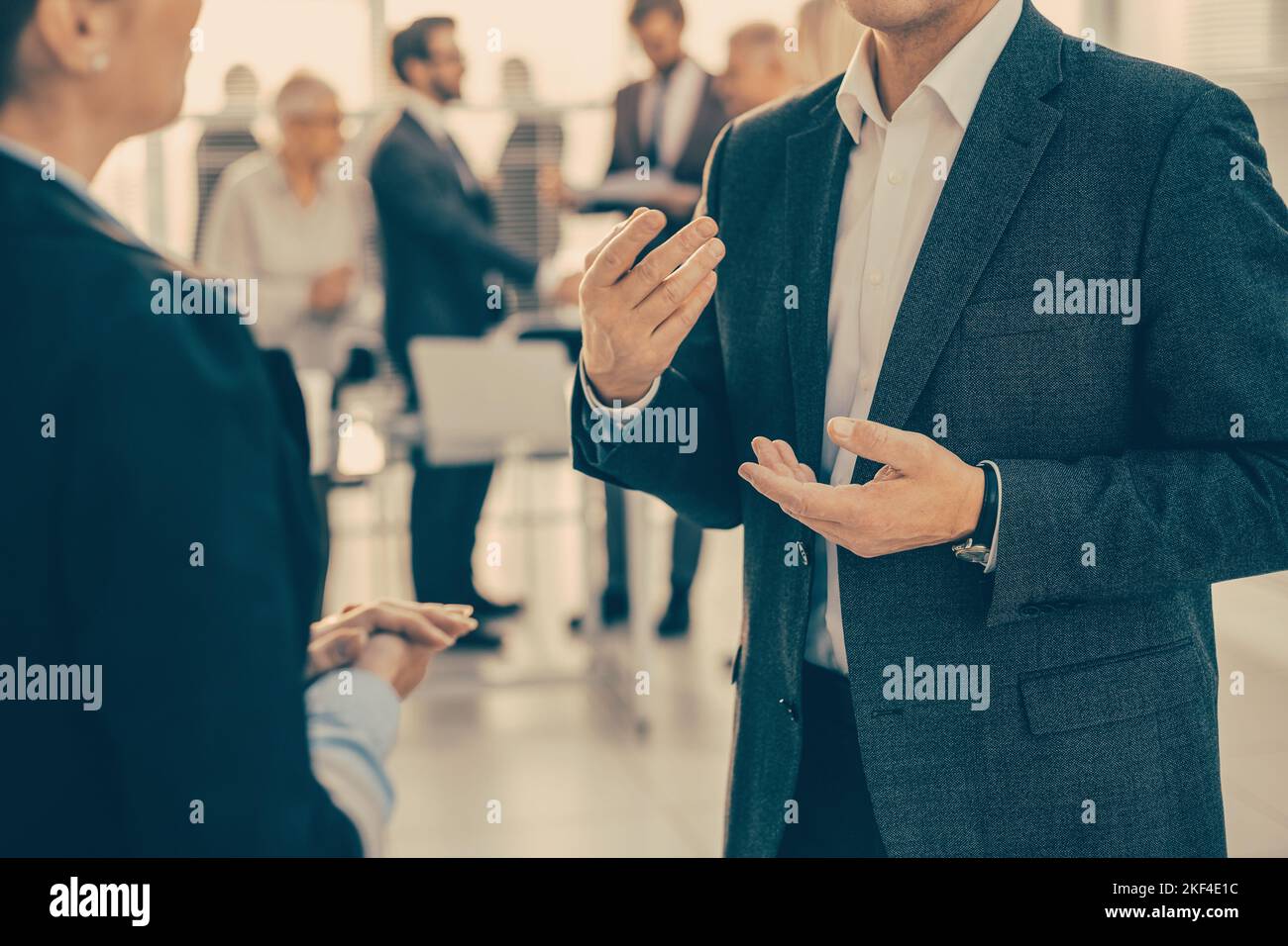 close up. two employees discussing work issues. Stock Photo