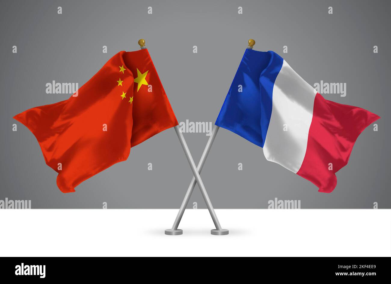 Two Wavy Crossed Flags of China and France, Sign of Chinese and French Relationships Stock Photo