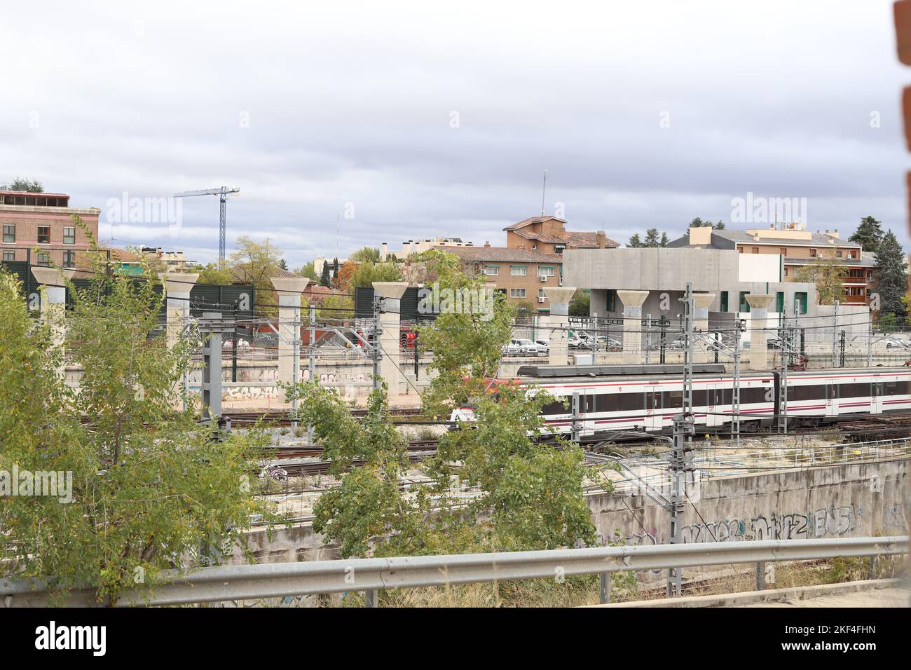 Train. Train tracks. Train entering a station. Subway leaving the
