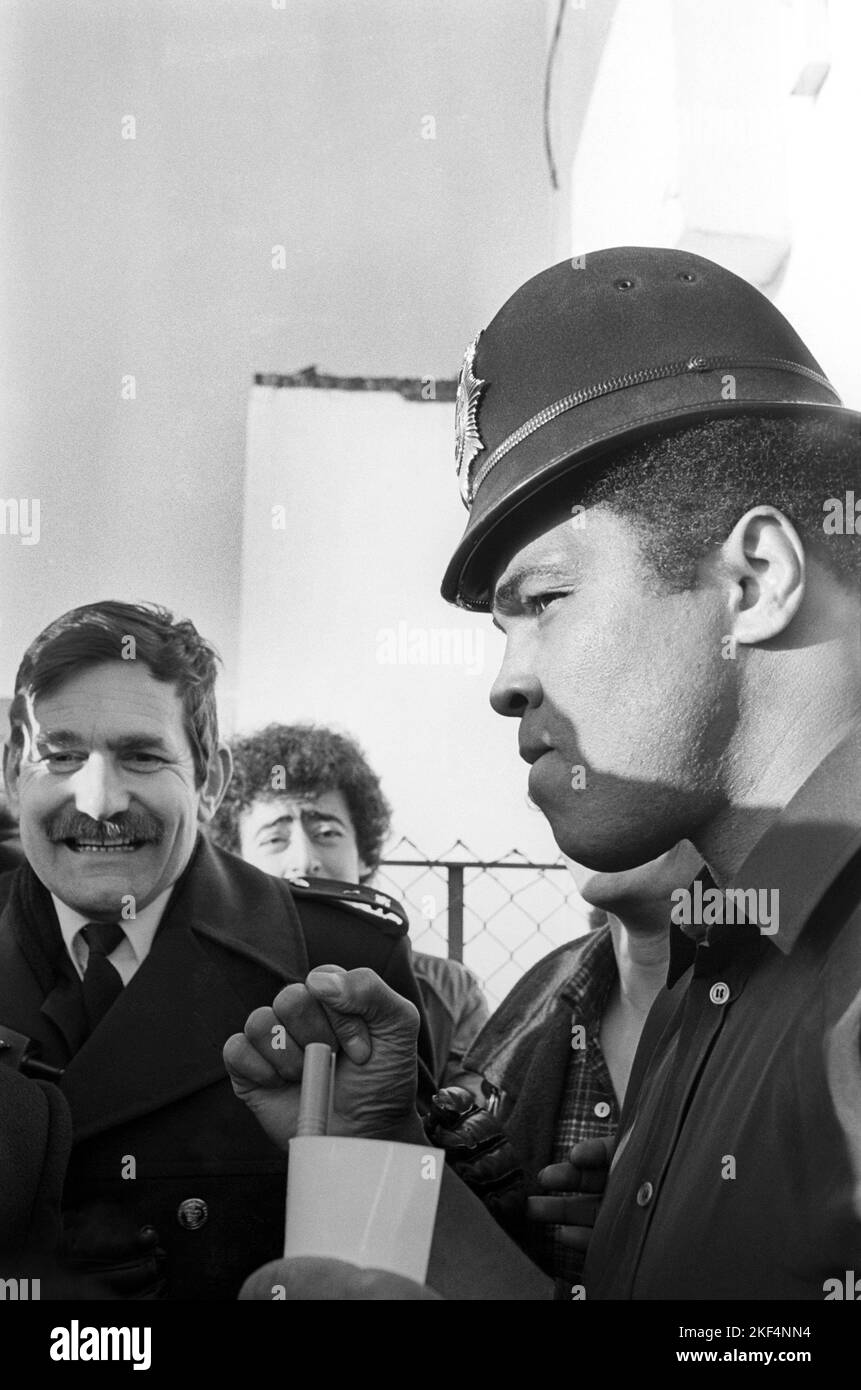 Sees Ali PC Alan Wood sees the funny side as boxer Muhammad Ali borrows his ...
