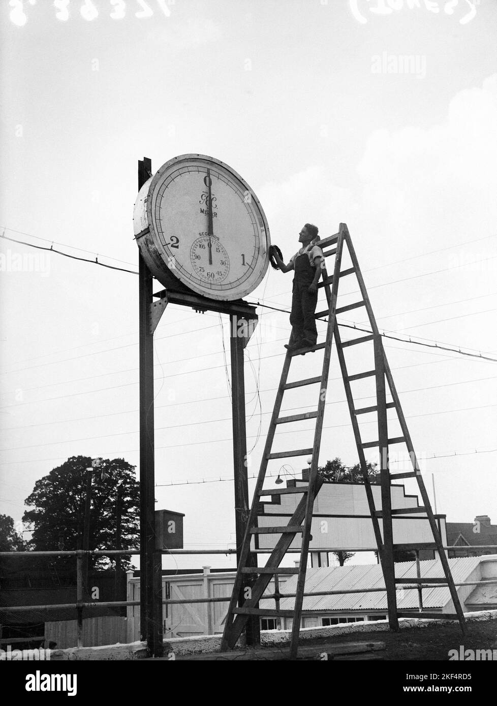 A huge stopclock is erected at trackside Stock Photo Alamy