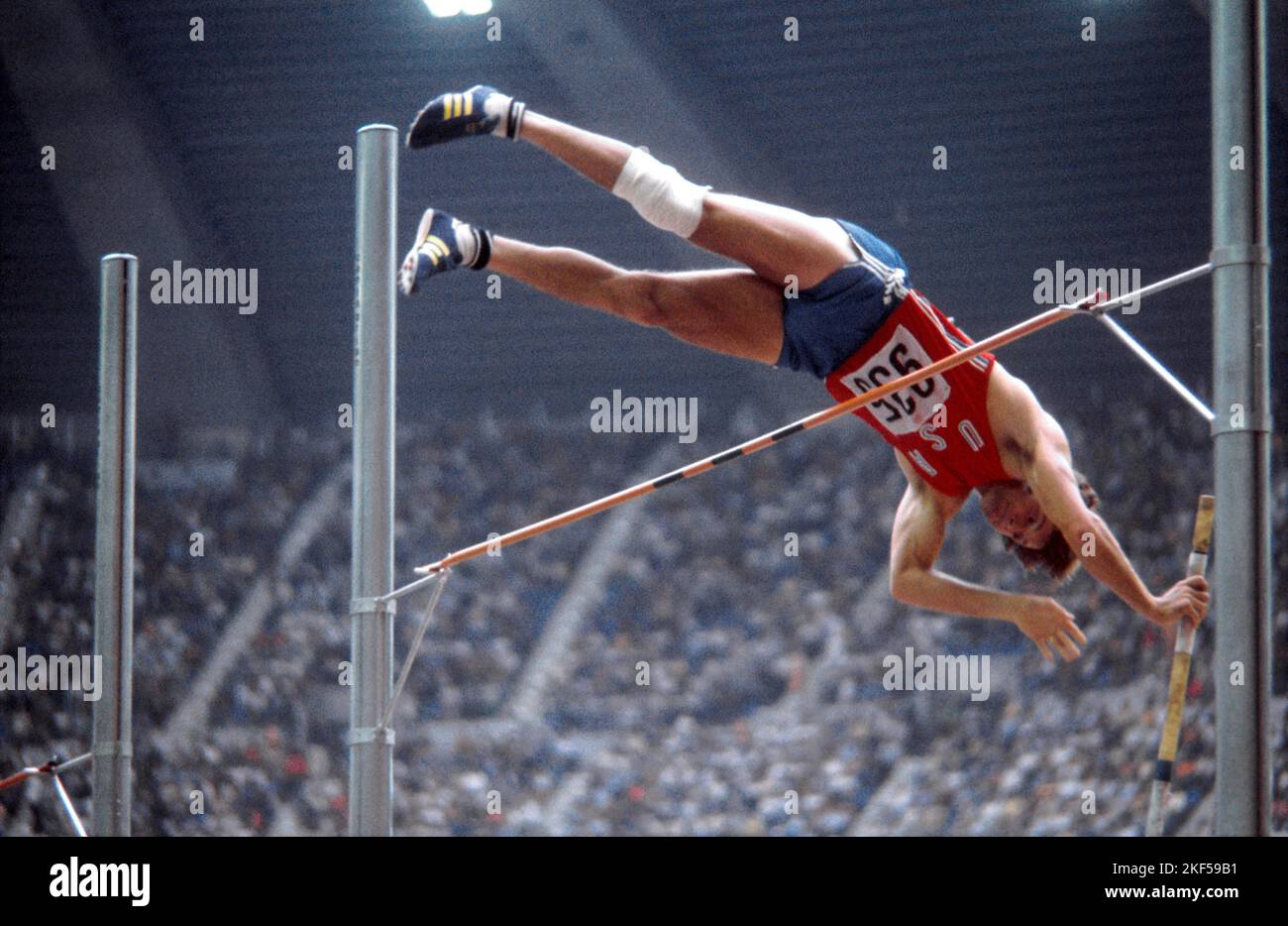 USA&rsquo;s Bruce Jenner clears the bar during the pole vault discipline of