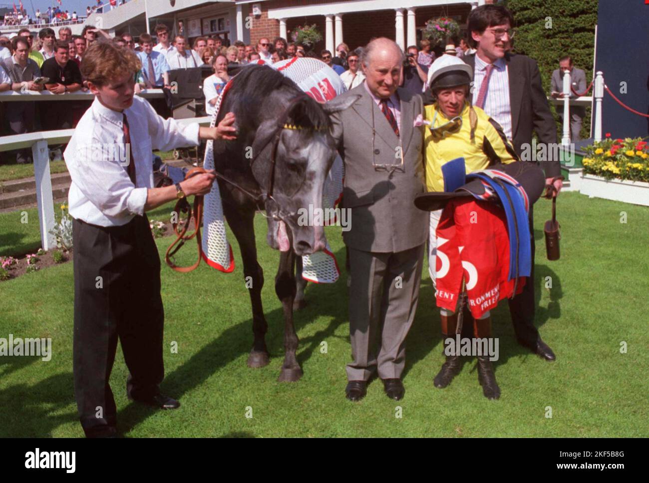 Environment Friend in the winner's enclosure with his jockey