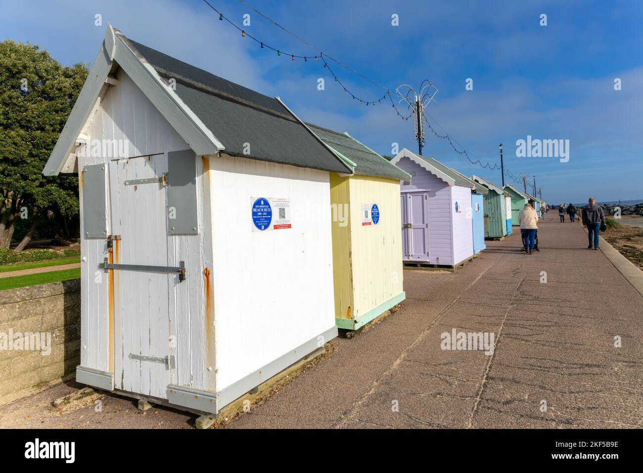 Historic wooden beach huts from 1880s on seafront, Felixstowe, Suffolk, England, UK Stock Photo