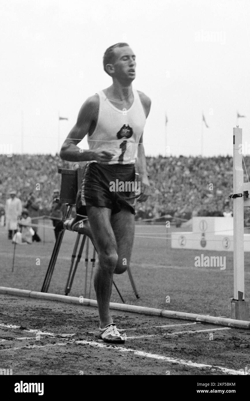 Australia's Herb Elliott crosses the finish line to win gold in the
