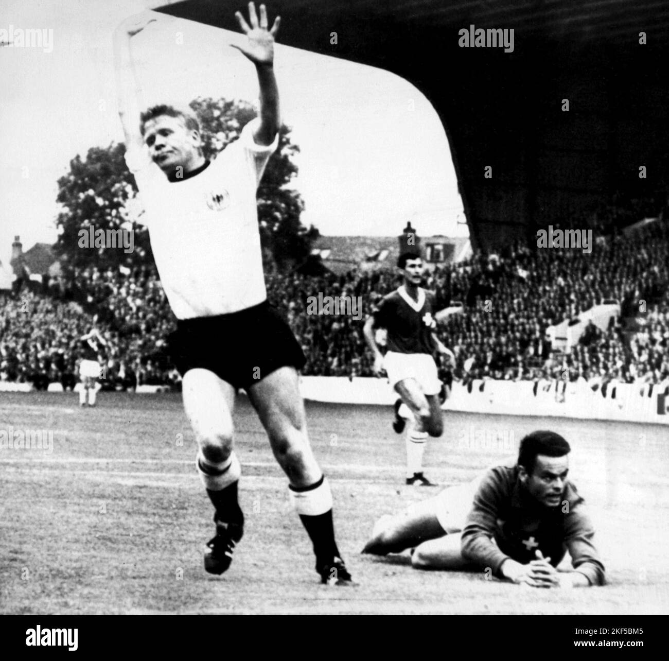 West Germany #39 s Helmut Haller (l) celebrates after scoring his team #39 s West Germany #39 s Helmut Haller (l) celebrates after scoring his team #39 s