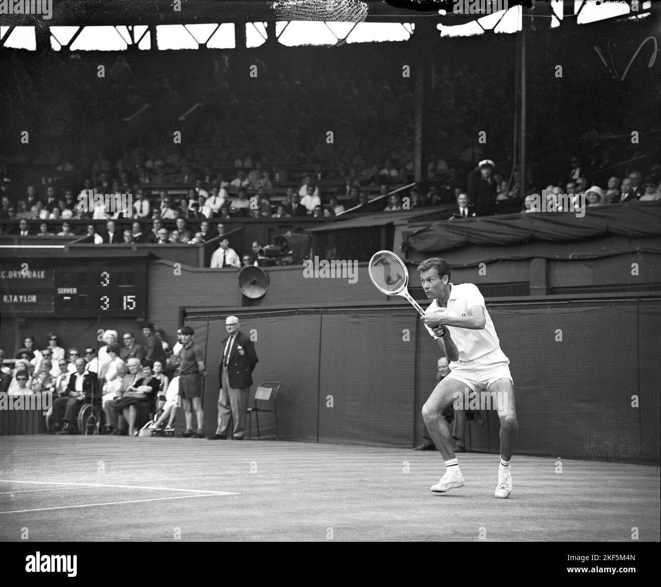 Cliff Drysdale plays a double handed return Stock Photo Alamy