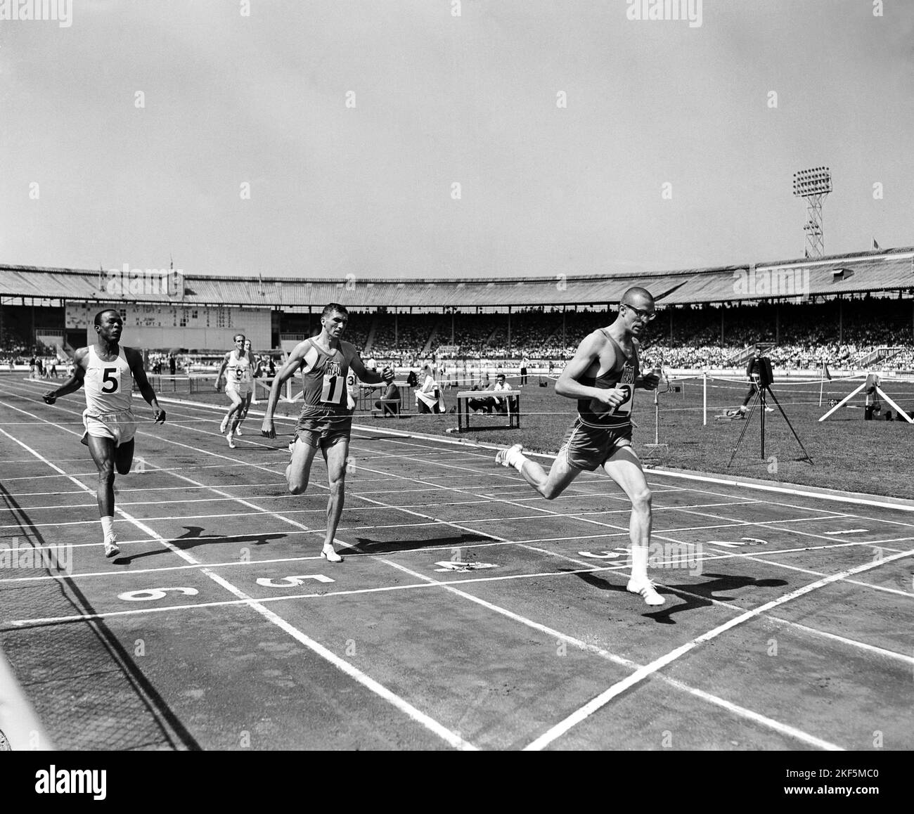 USA's Mike Larrabee (r) crosses the line to win from teammate Ollan