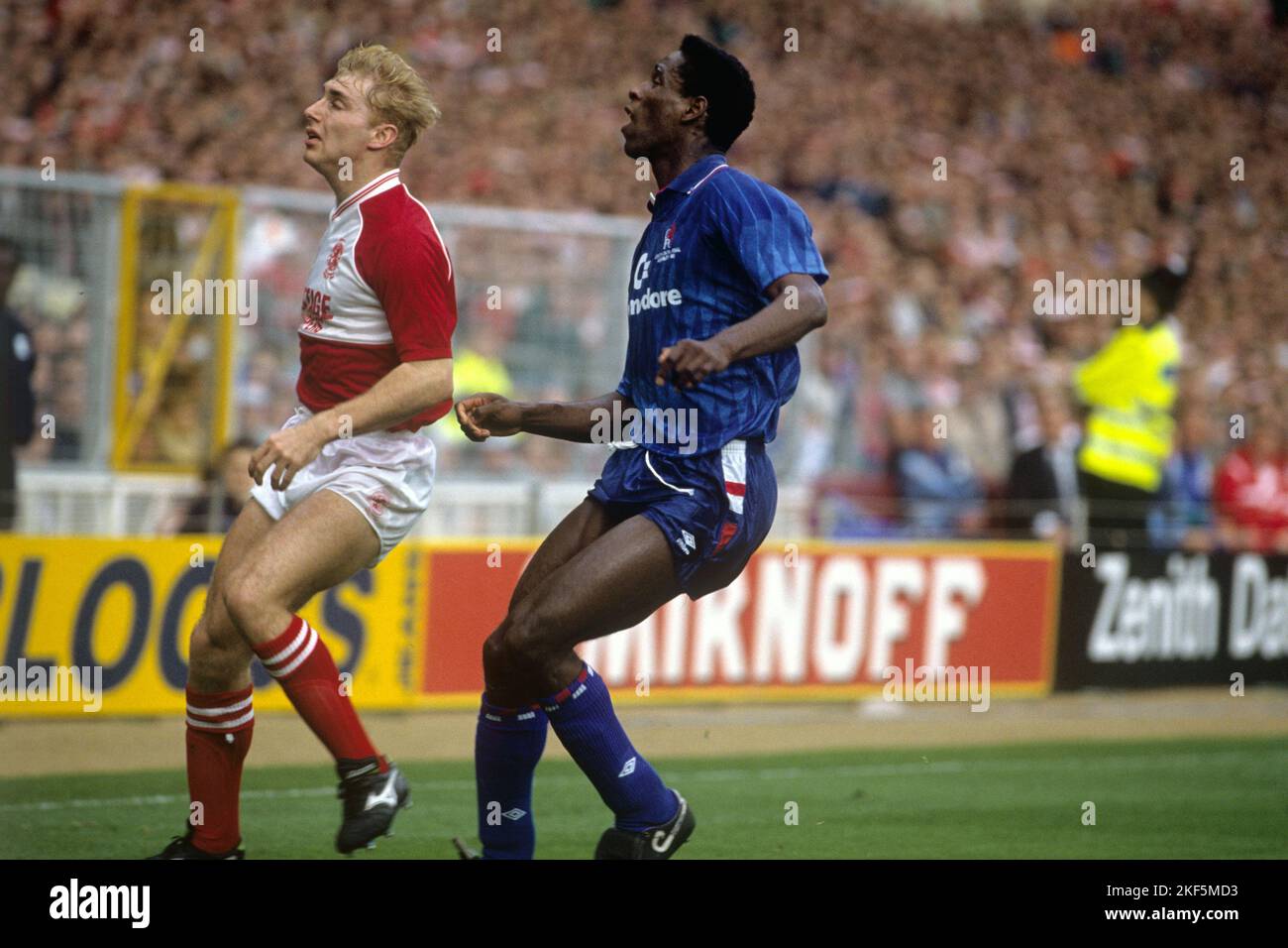 Chelsea's Ken Monkou (r) and Middlesbrough's Stuart Ripley (l) watch ...