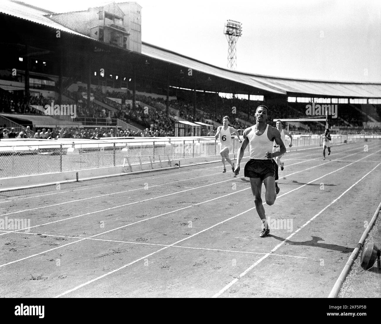 Jamaica's Herb McKenley wins the men's 300m Stock Photo Alamy